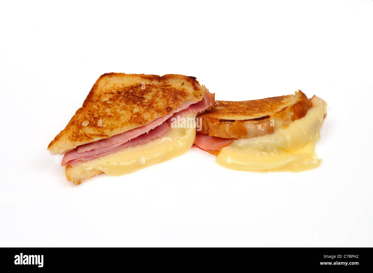Gegrillter Schinken und Käse Sandwich halbiert auf weißem Hintergrund, Ausschnitt. Stockfoto