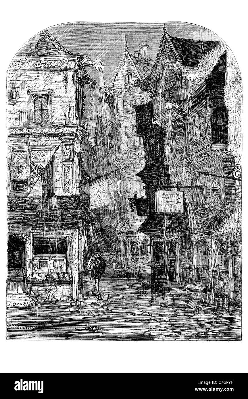 Feuchte Tag London Zeit Königin Elizabeth Stadt Straße alte Geschäfte nach Hause Pub Mann Winter außerhalb cobled Straßen Slum Haus Regen Wetter Stockfoto