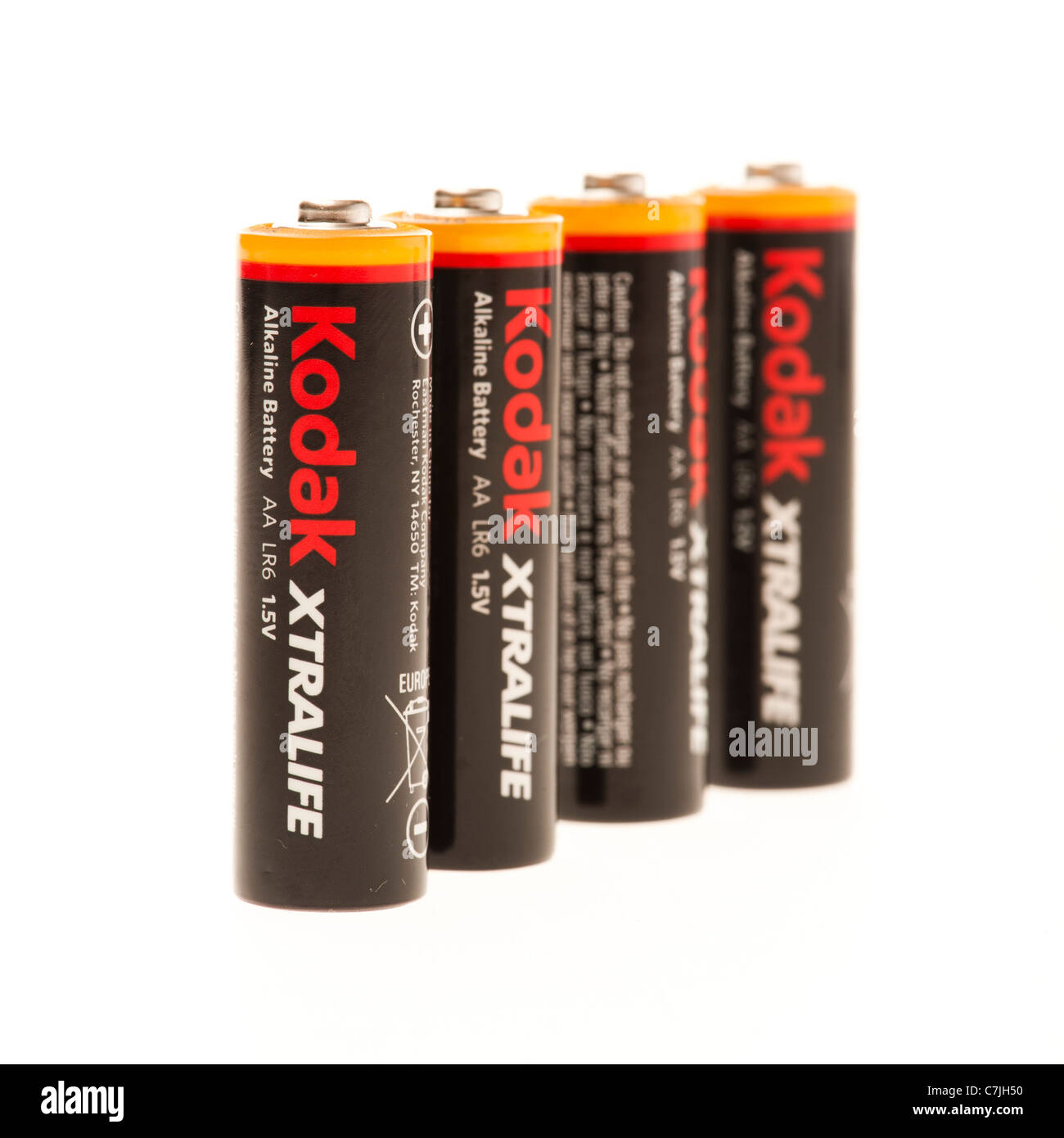 Vier Kodak AA-Batterien auf eine weiße Hintergrundbeleuchtung-Hintergrund Stockfoto