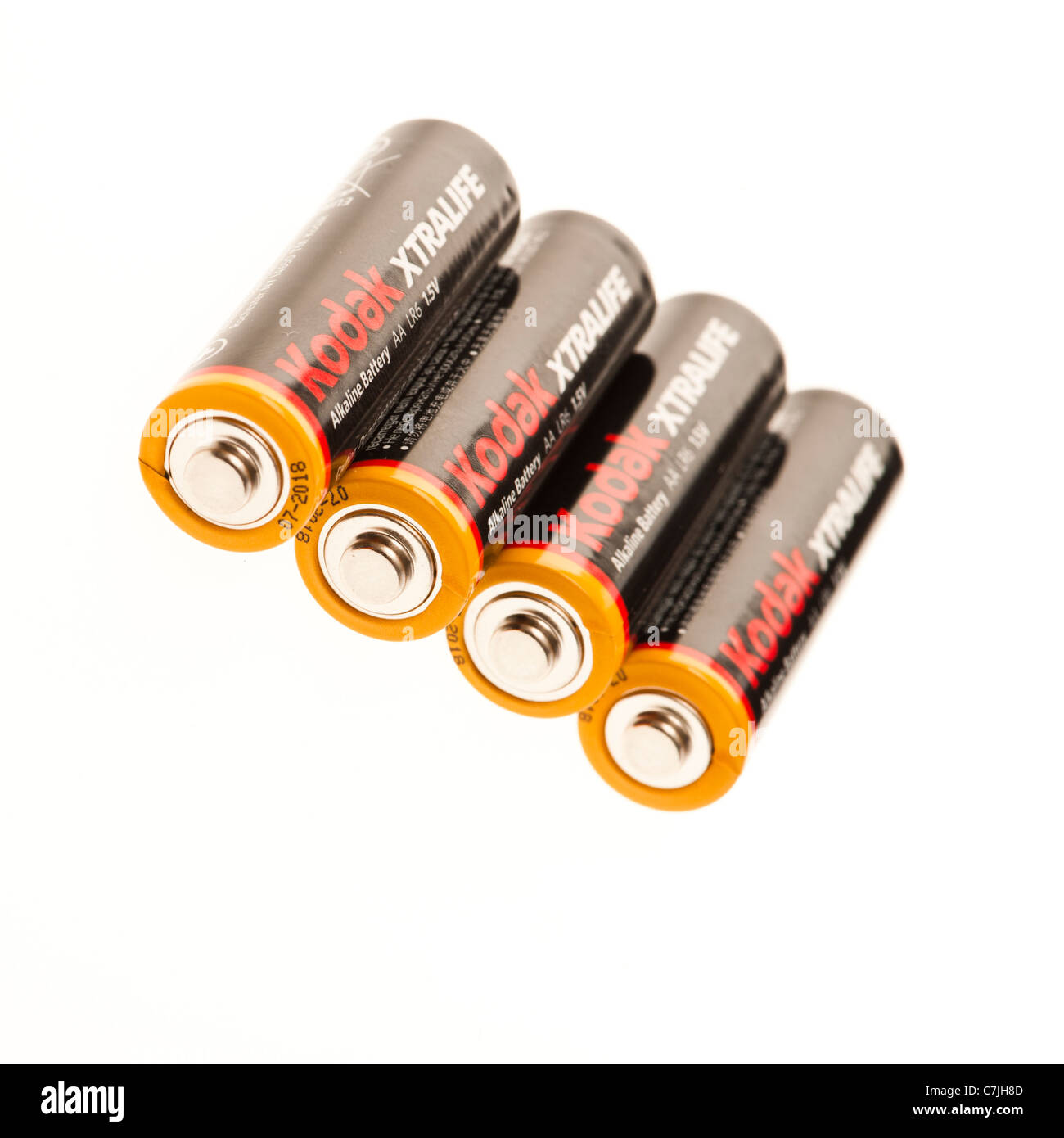 Vier Kodak AA-Batterien auf eine weiße Hintergrundbeleuchtung-Hintergrund Stockfoto