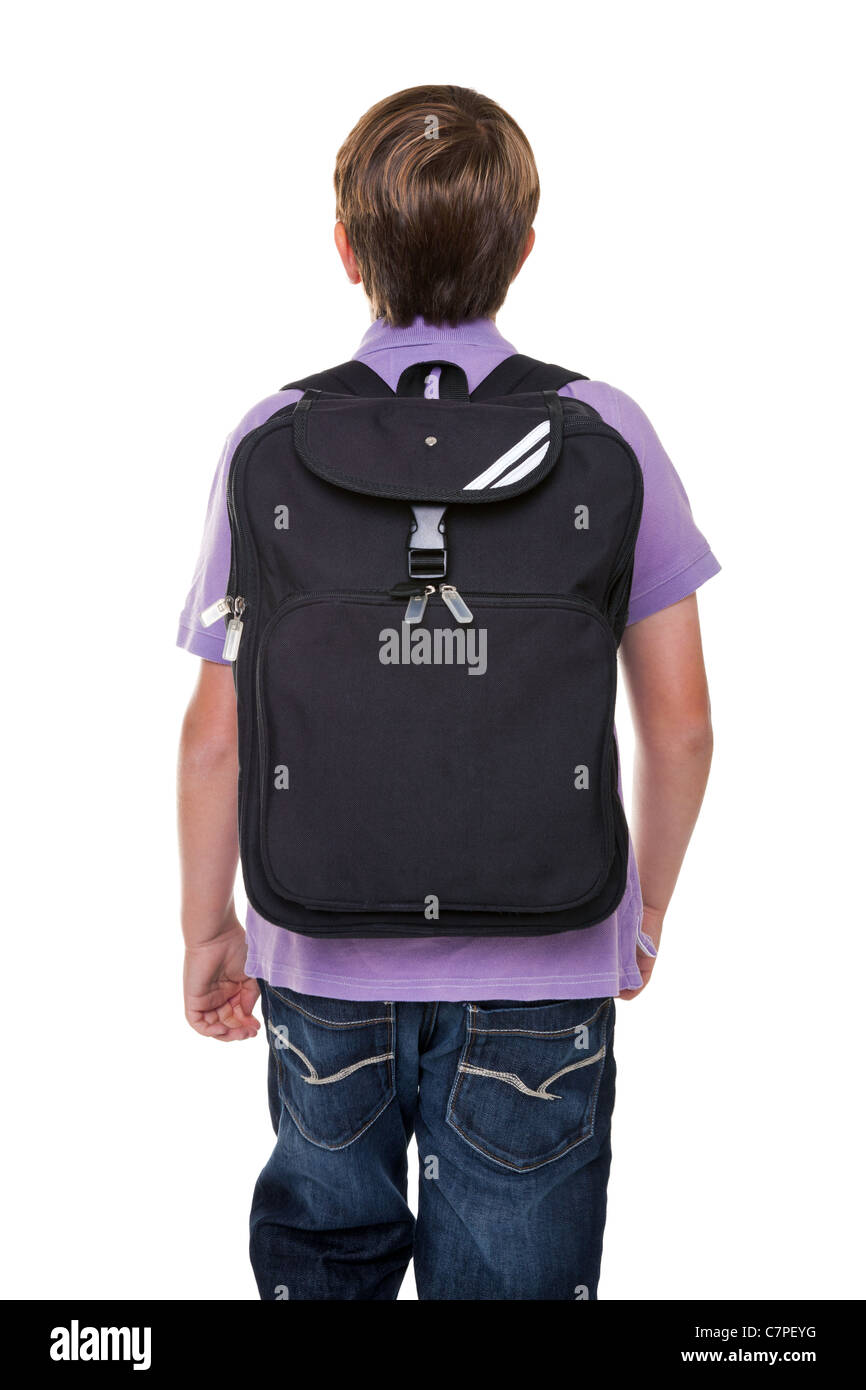 Foto von einem 11 Jahre alten Schule Jungen tragen seine Schultasche Rucksack, isoliert auf einem weißen Hintergrund. Stockfoto