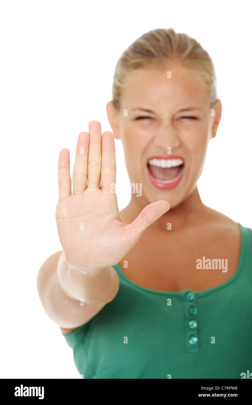 helles Bild der jungen Frau Stop Geste. Isoliert auf weißem Hintergrund. Stockfoto