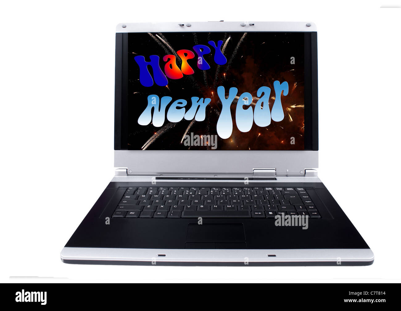 Laptop-Computer mit einem Happy New Year bunten Urlaub Hintergrund auf dem Bildschirm. Objekte über weiß. Stockfoto