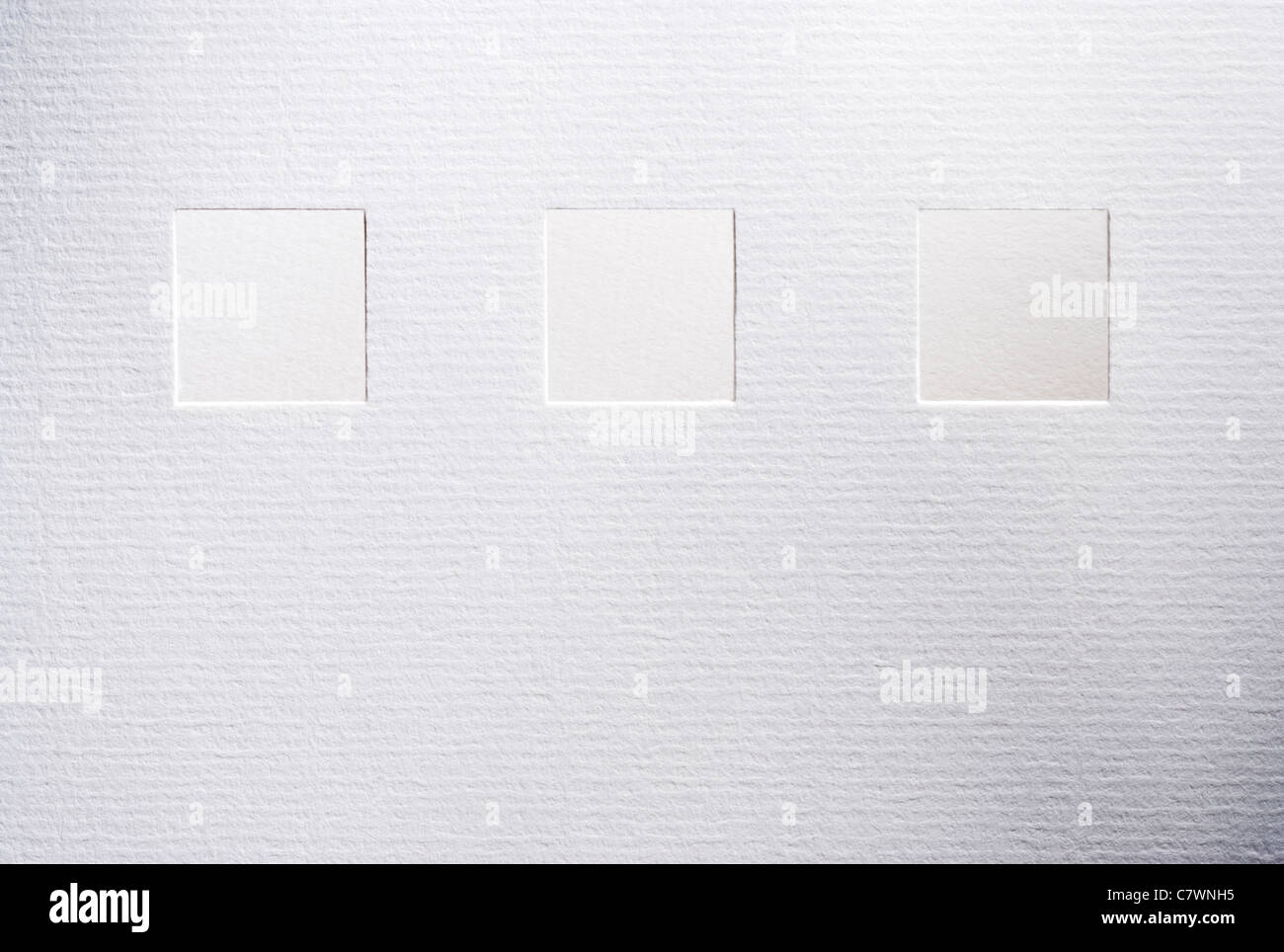 Quadrate schneiden in strukturierten Weißbuch Stockfoto