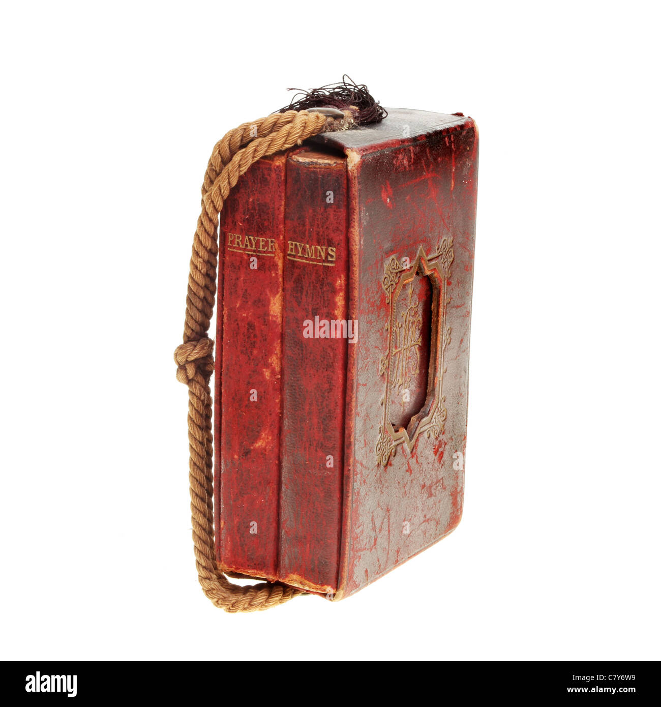 Antikes rotes-Leder gebunden Gebet und Gesangbücher in einem Fall mit einer Schnur Griff isoliert gegen weiß Stockfoto