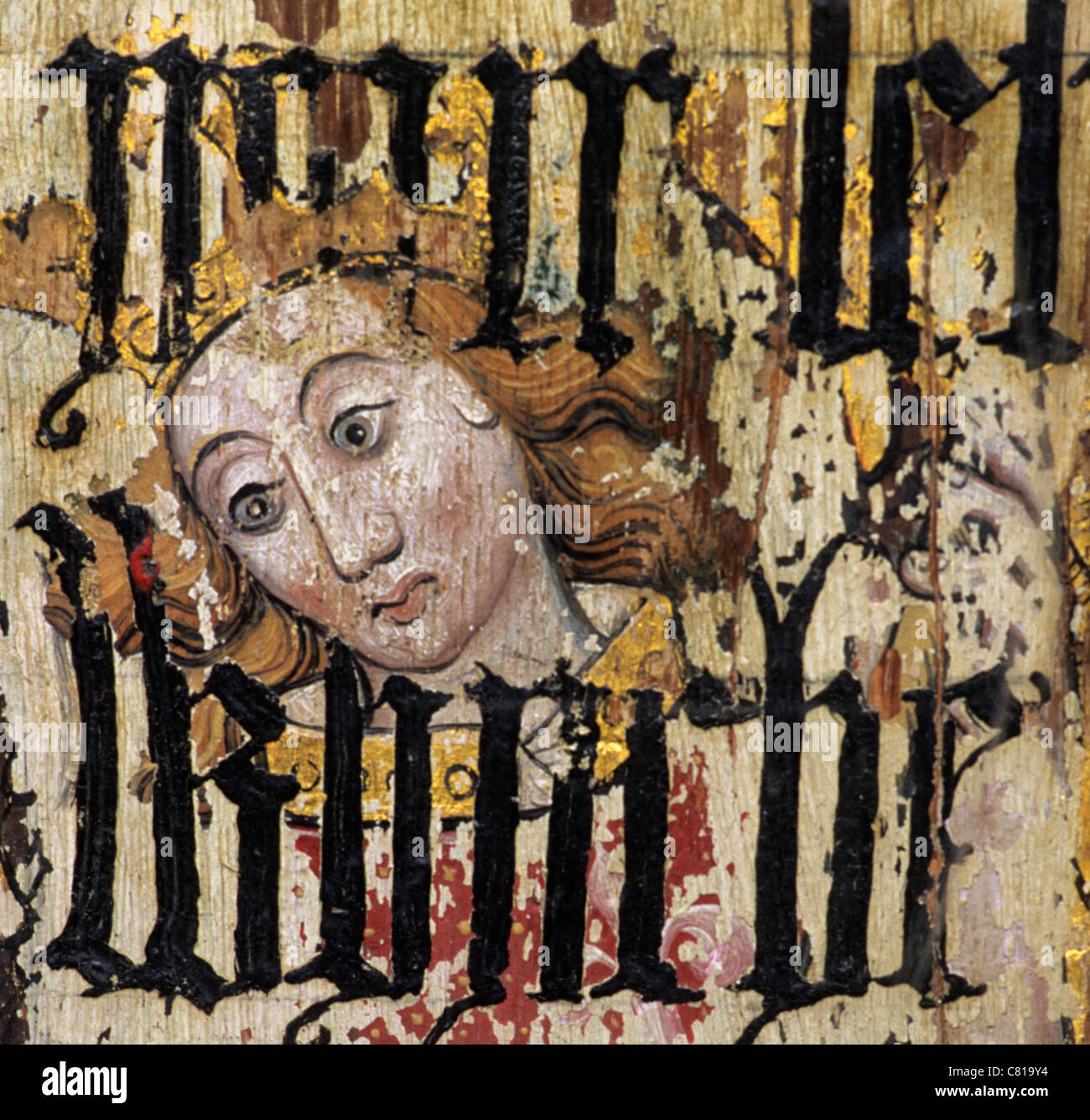 Binham Priory, Norfolk, Lettner. Der Erzengel Michael überdruckt mit Text von Cranmers Bibel während der Reformation Stockfoto