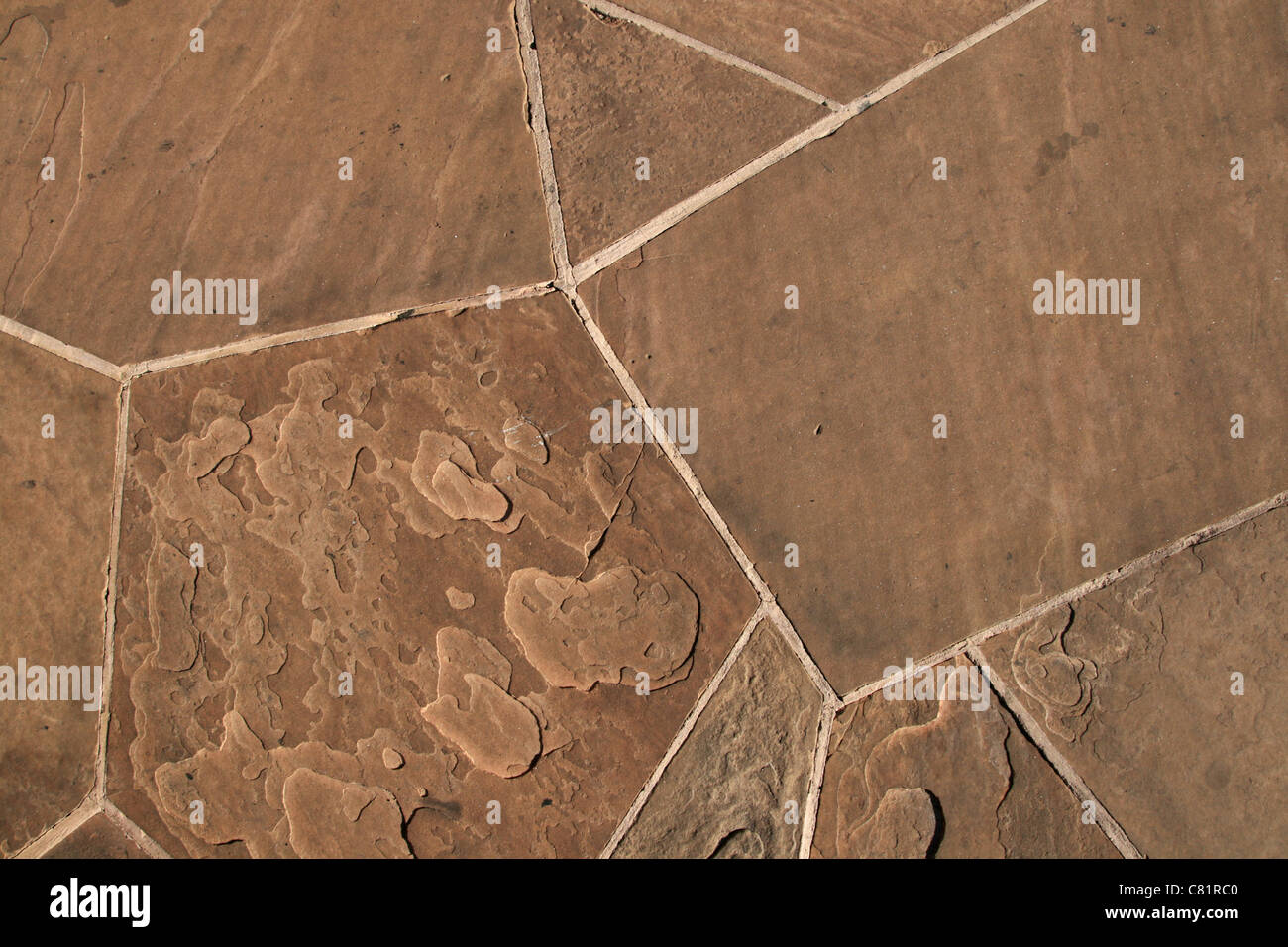 Hintergrund der Sandstein Platten mit unregelmäßigen Formen Stockfoto