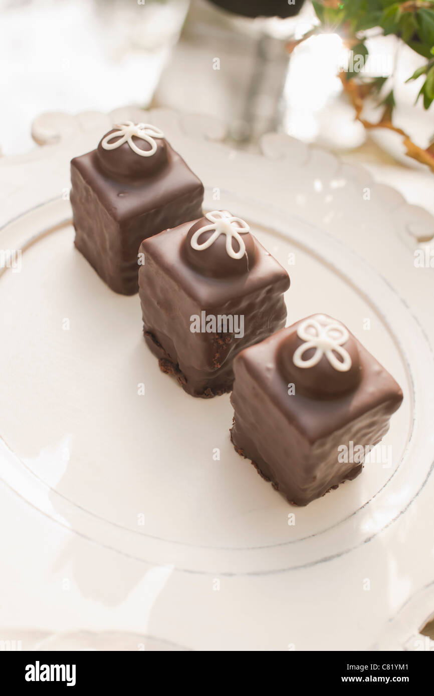 Drei Schokoladenganache zierliche Kuchen Stockfoto