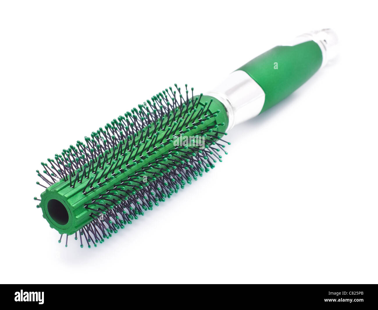 grüne Haare Bürste isoliert auf weißem Hintergrund Stockfoto