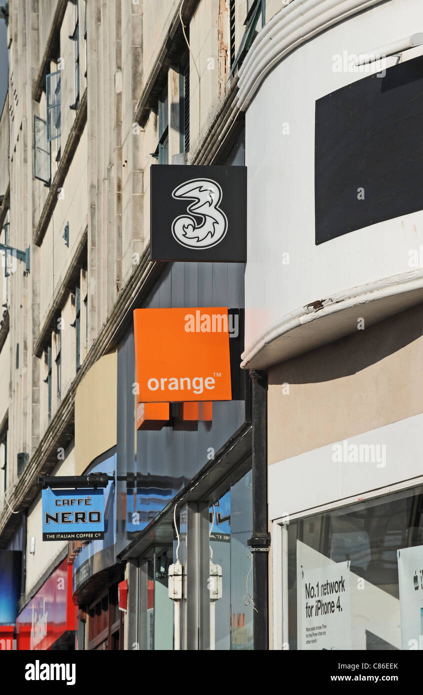 Orange und 3 Handy-Shops neben einander Brighton UK Stockfoto