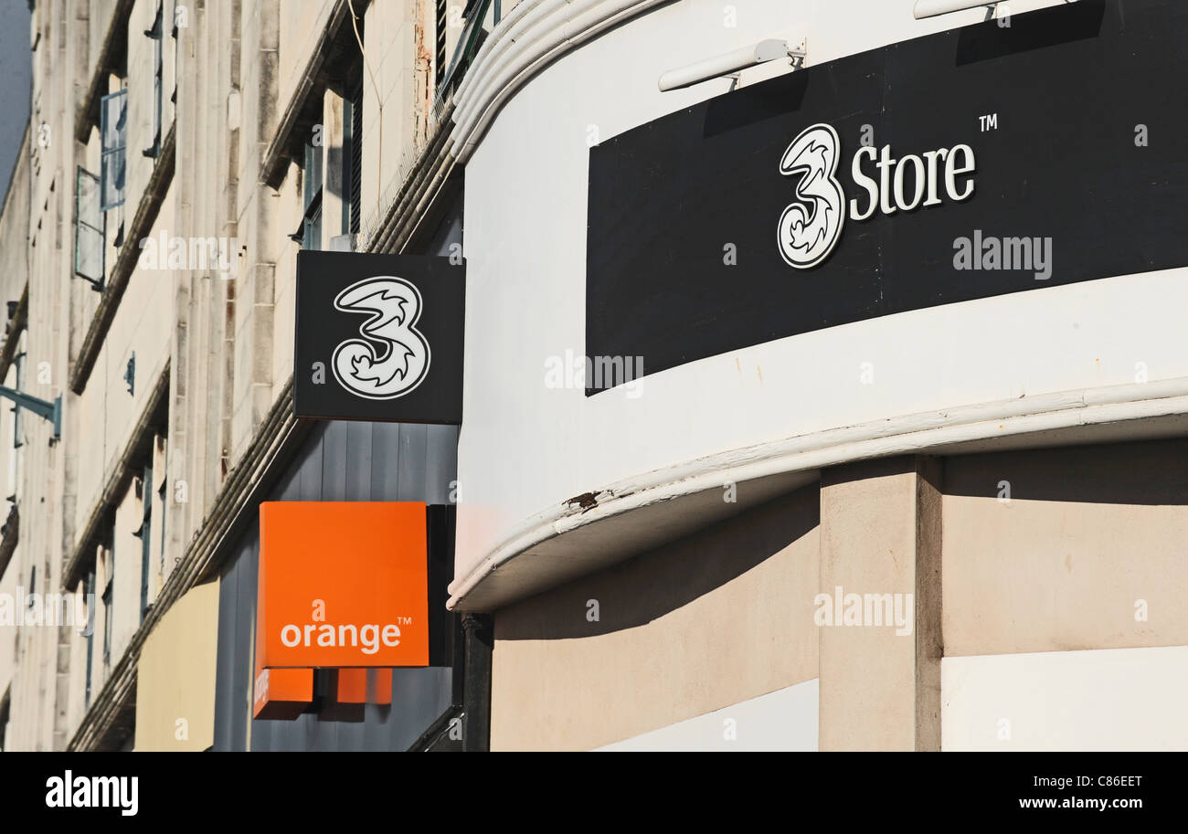 Orange und 3 Handy-Shops neben einander Brighton UK Stockfoto