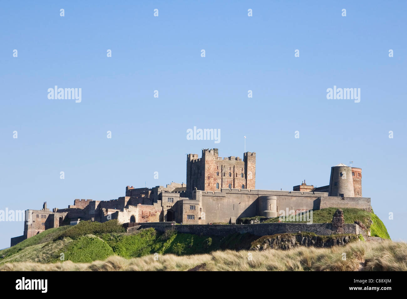 Bamburgh Castle, Bamburgh, Northumberland Küste, England. Stockfoto