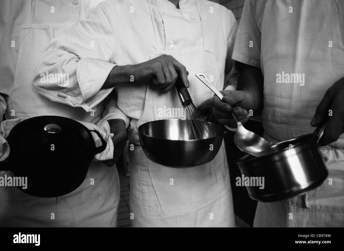 Köche kochen in schwarz / weiß Stockfoto