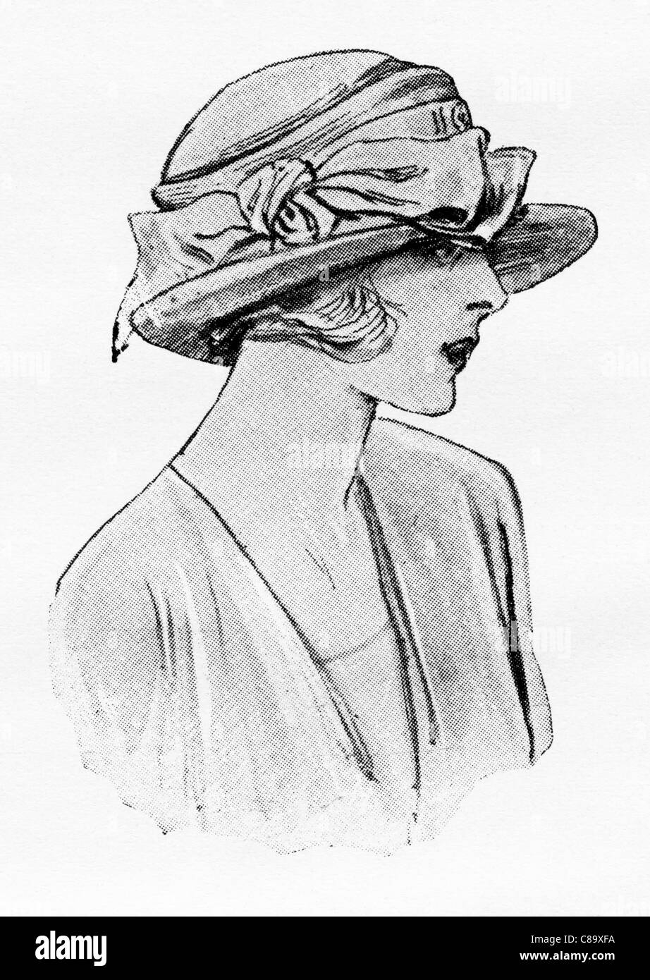 Mode-Illustration, ca. 1922. Neue eng anliegende Einsatz Filzhut mit einer großen Schleife getrimmt. Stockfoto