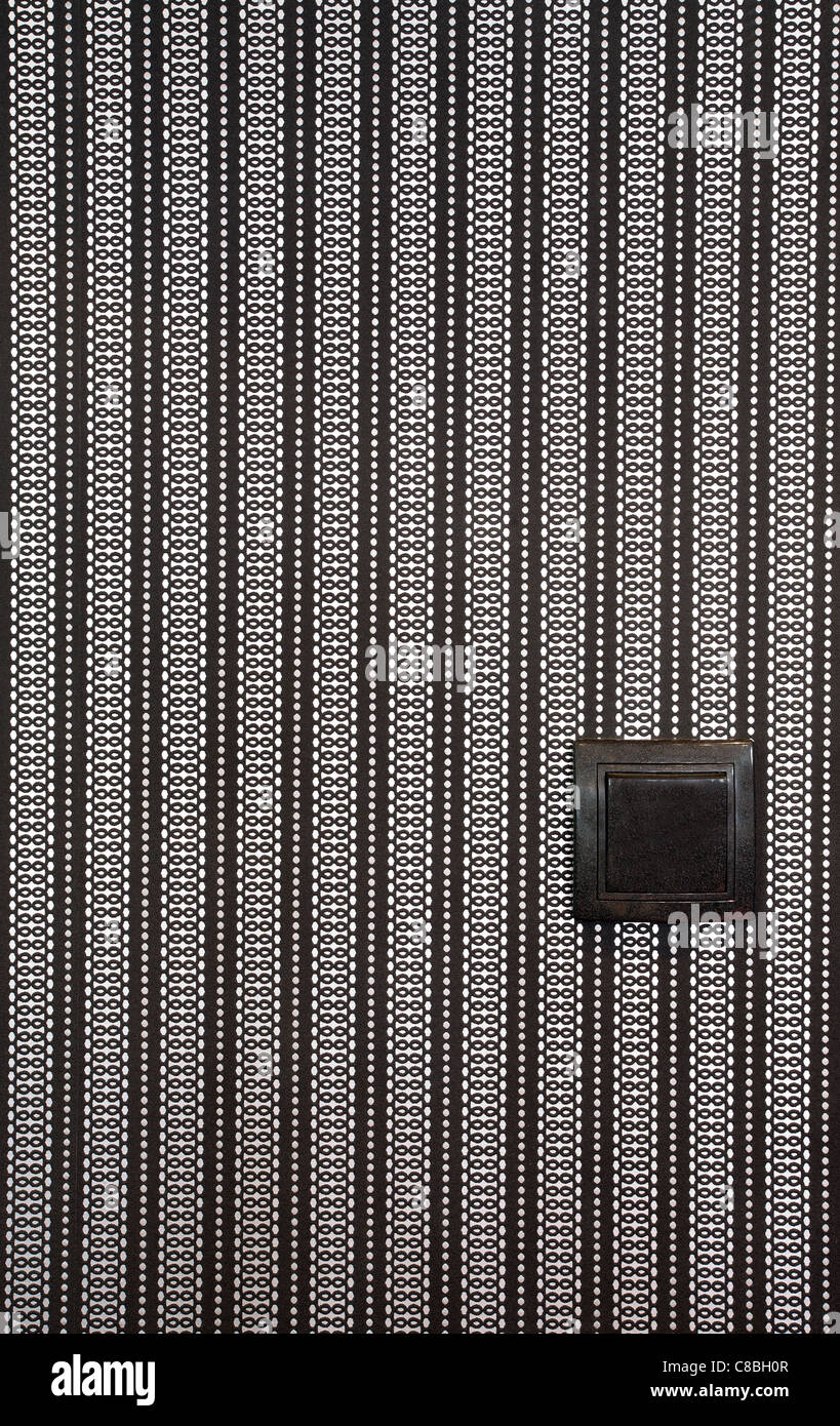 Teil der Tapeten mit Schalter für Licht. Stockfoto