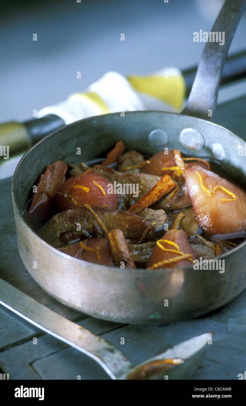 Schweinefleisch mit Birnen Stockfoto