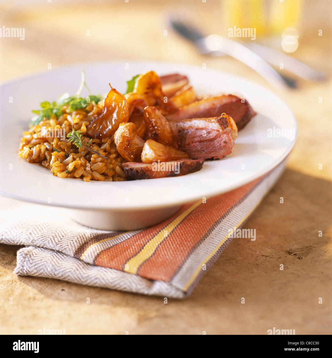 Filets von Entenbrust mit karamellisierten Mandarinen Stockfoto