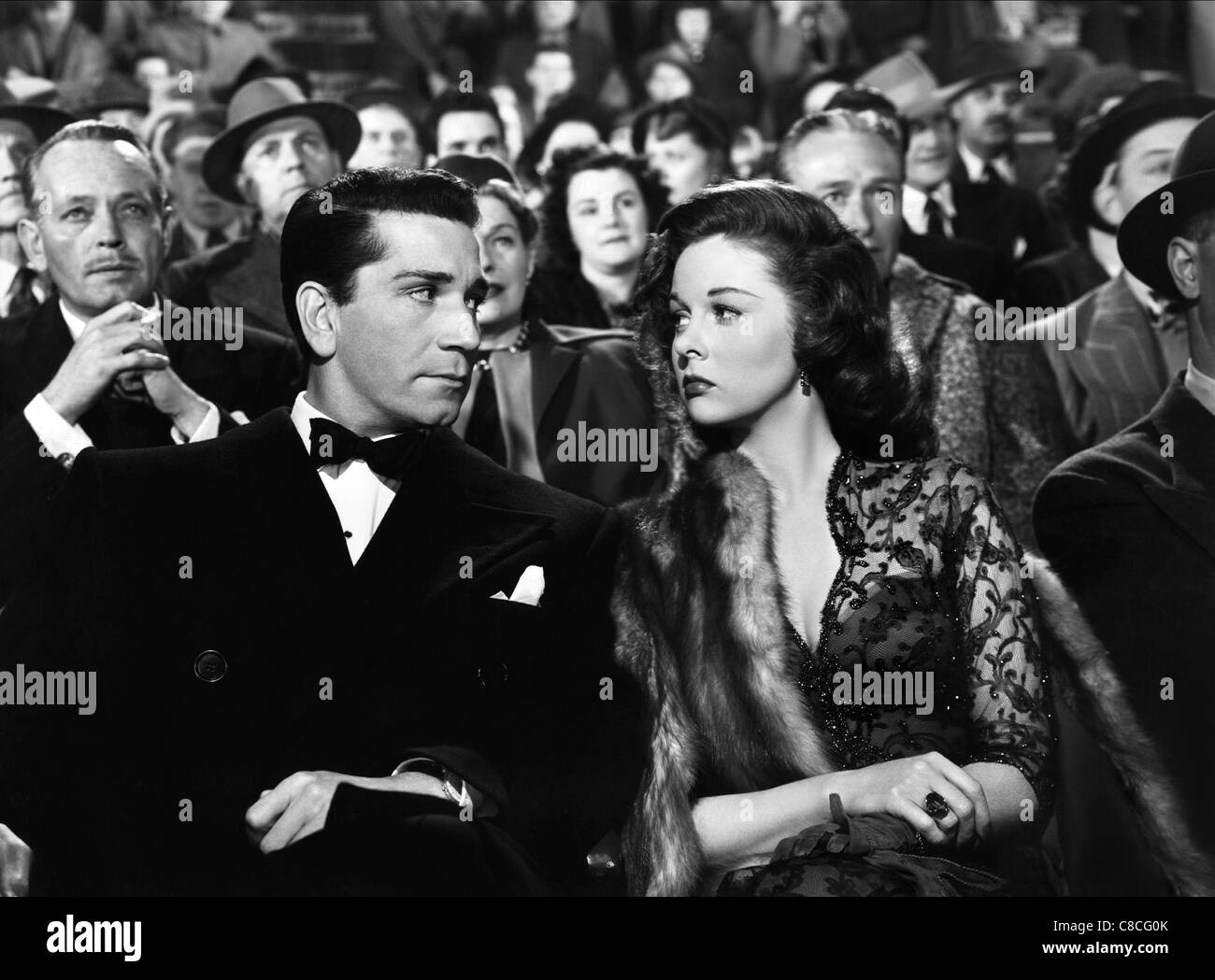 RICHARD CONTE, SUSAN HAYWARD, HAUS DER FREMDEN, 1949 Stockfoto