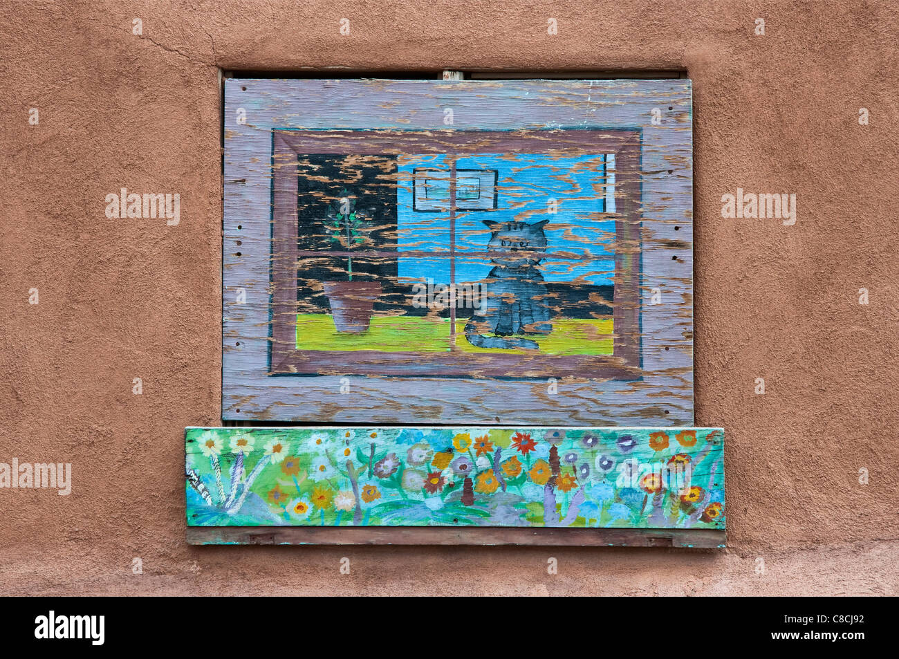 Malerei an Adobe-Wand im Haus in Santa Cruz, New Mexico, USA Stockfoto