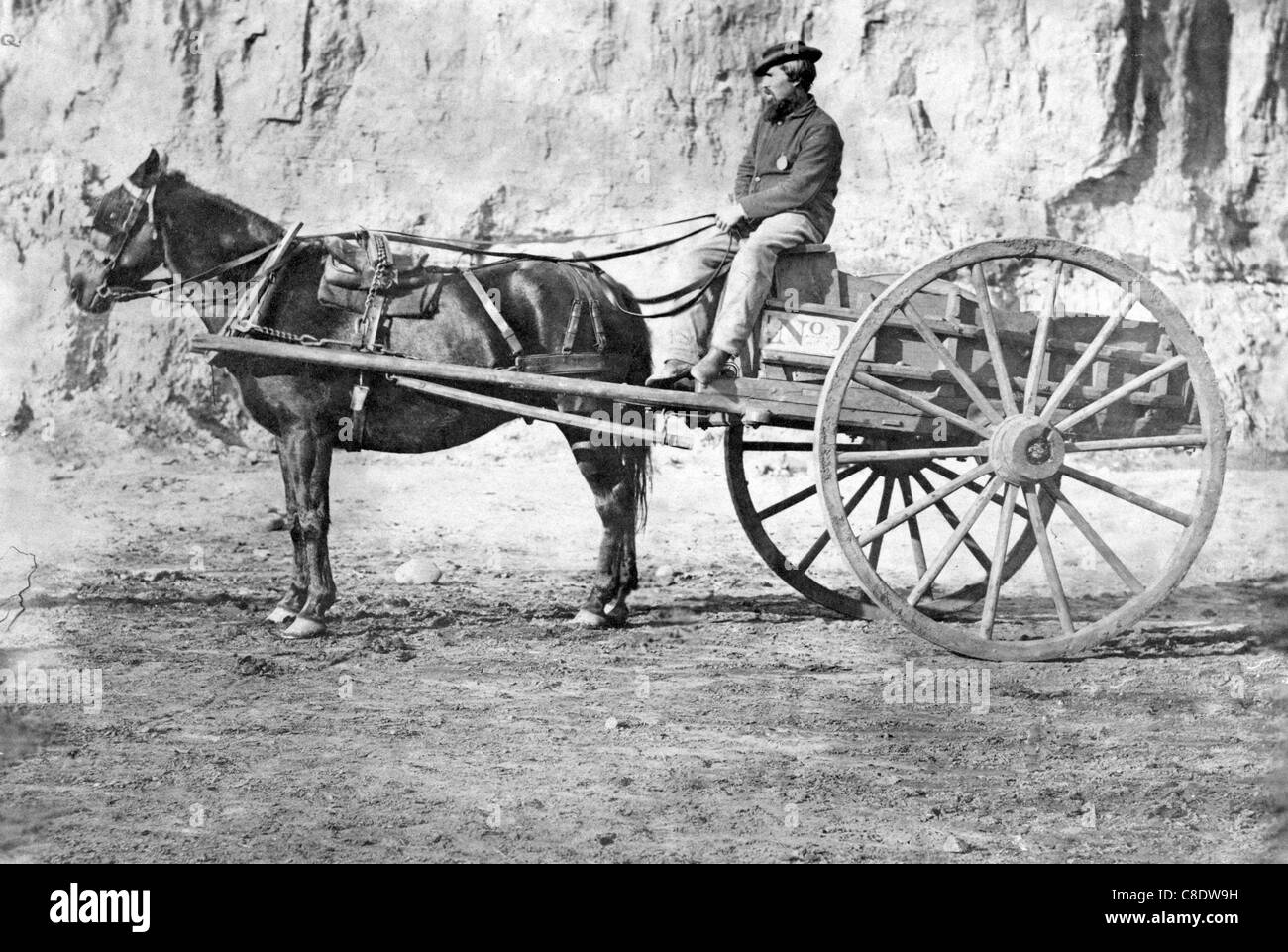 Mann sitzt in einem Pferd gezeichneten Wagen während USA Bürgerkrieg ca. 1863 Stockfoto