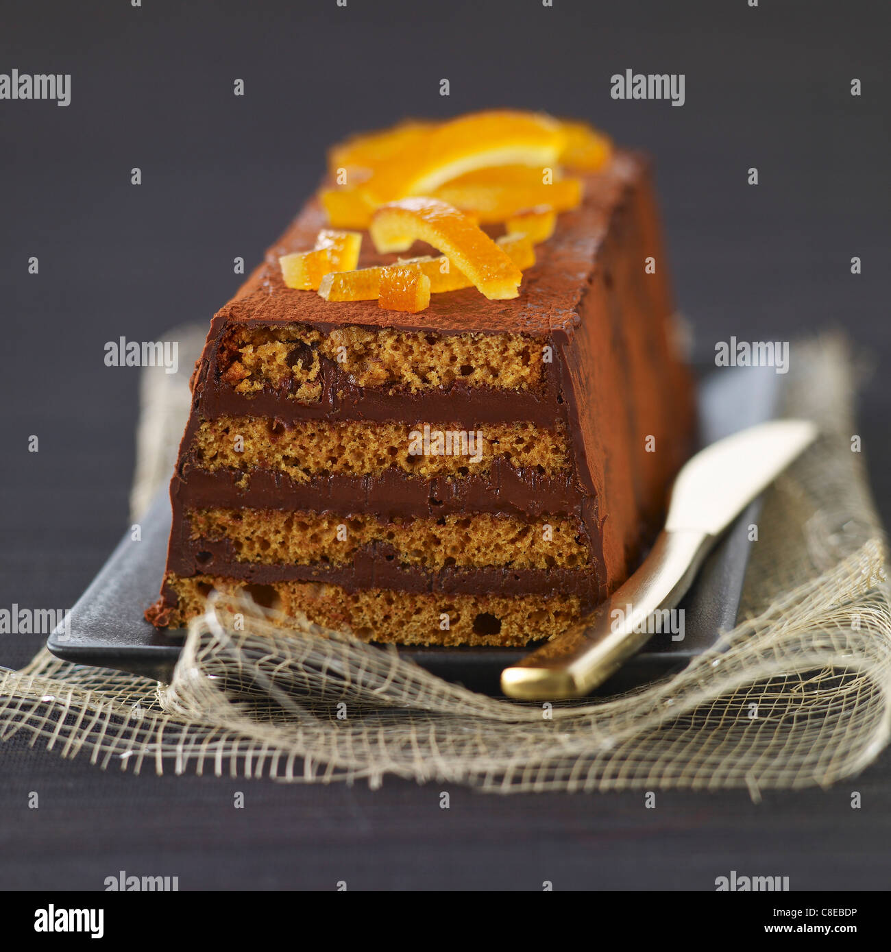 Lebkuchen, Schokolade und kandierten Orangen Log Kuchen Stockfoto
