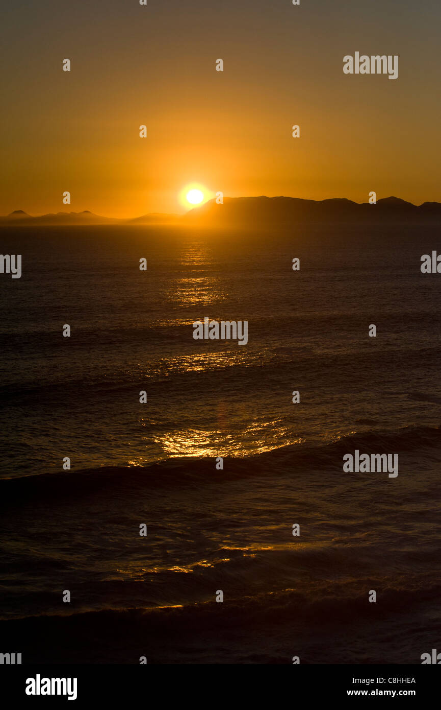 Sonnenuntergang Küstenlinie entlang der Route 44 False Bay und Table Mountain Western Cape Südafrika Stockfoto