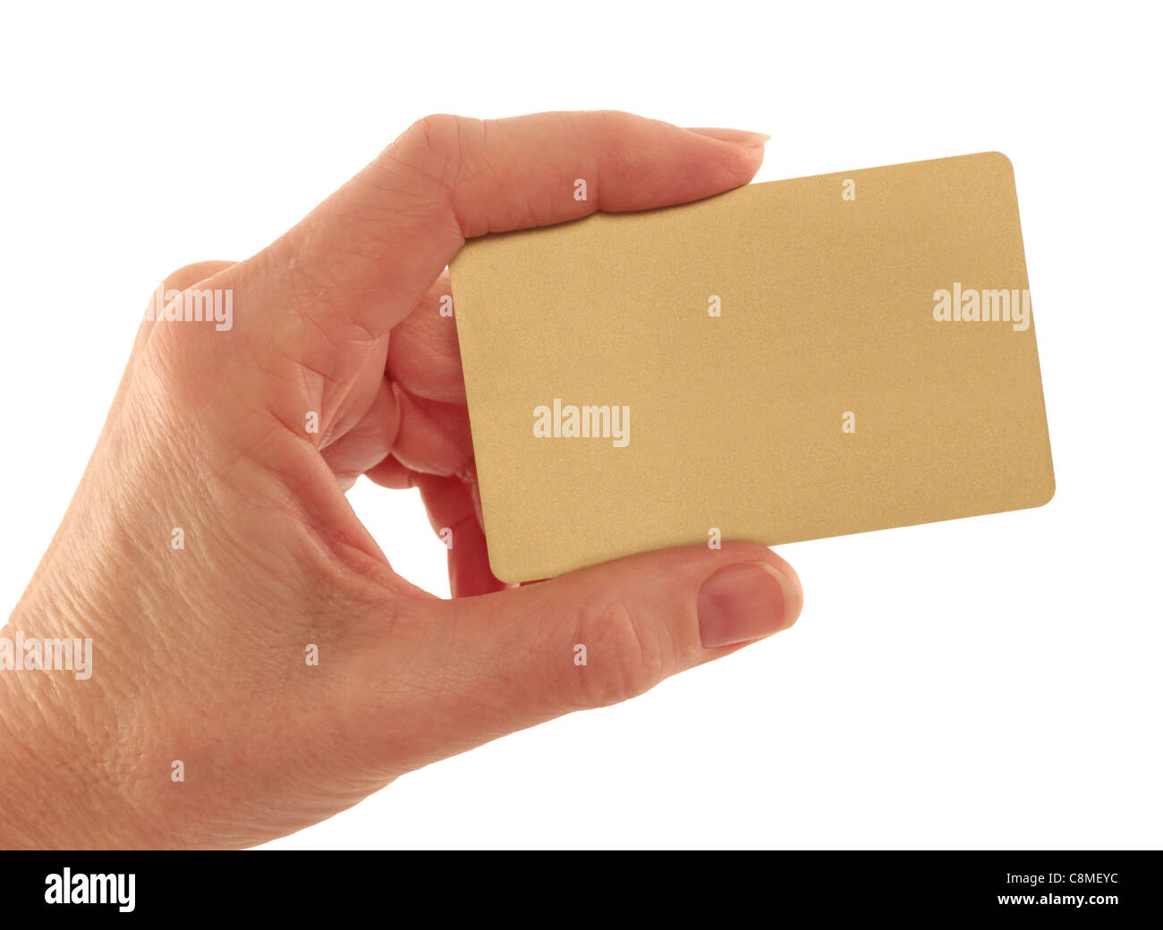 Hand mit Gold Kreditkarte auf weiß Stockfoto