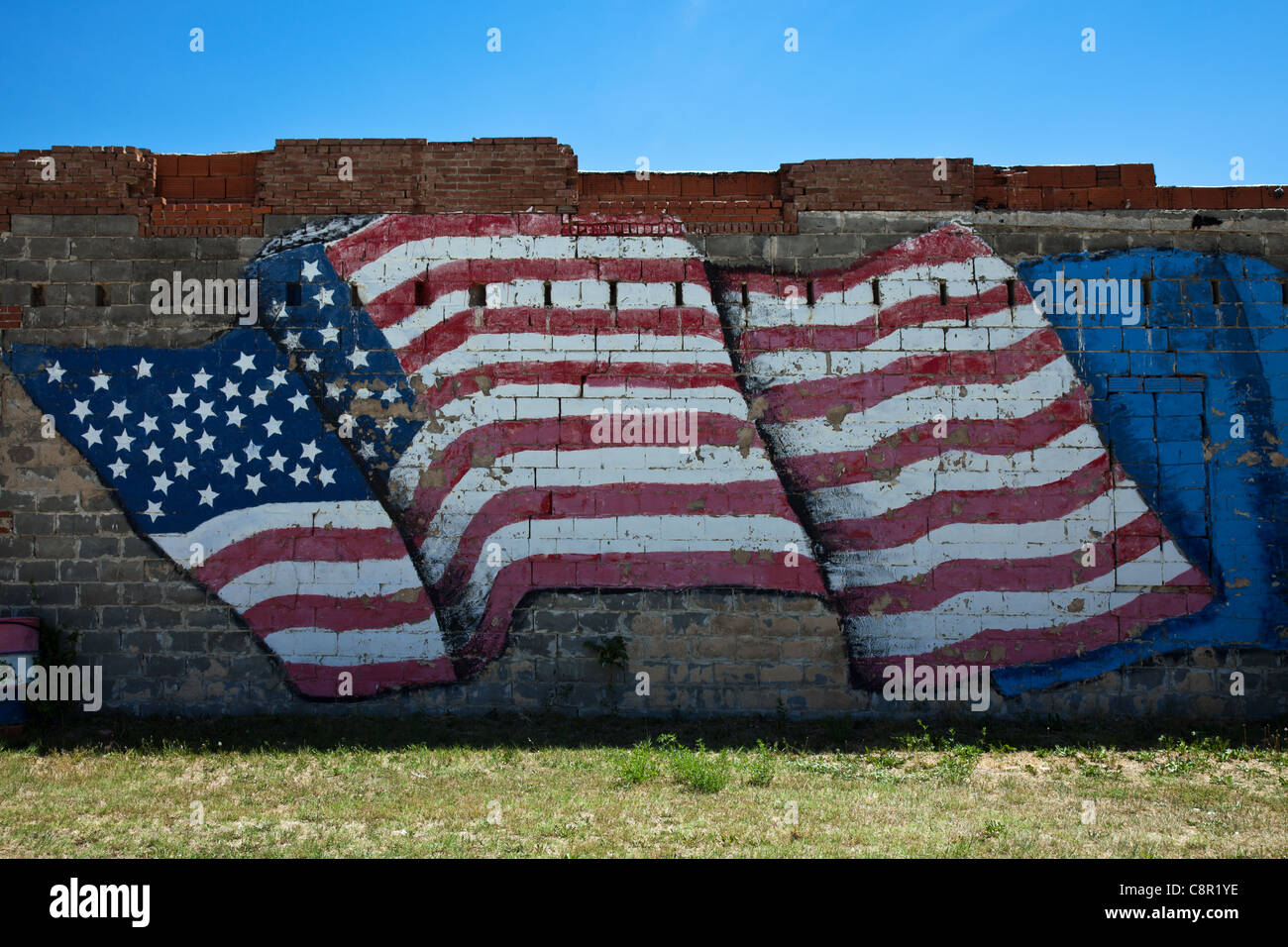 Vereinigte Staaten von Amerika Oklahoma, Route 66, Erick, eine Fahne an der Wand Stockfoto