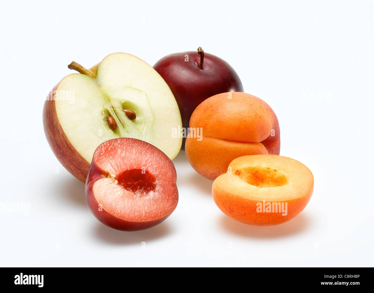 Apfel Aprikose Pflaume Stockfoto