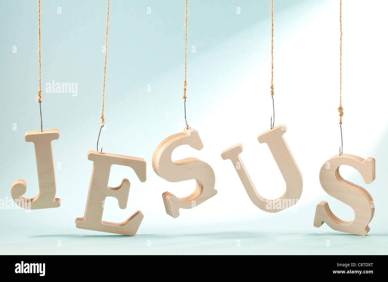 Einziges Wort "Jesus" Haken am seidenen Stockfoto