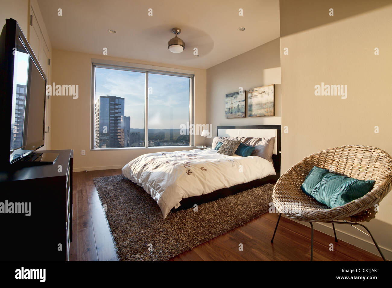 Zweites Schlafzimmer in einer Innenstadt Hochhaus Eigentumswohnung in Austin, Texas Stockfoto