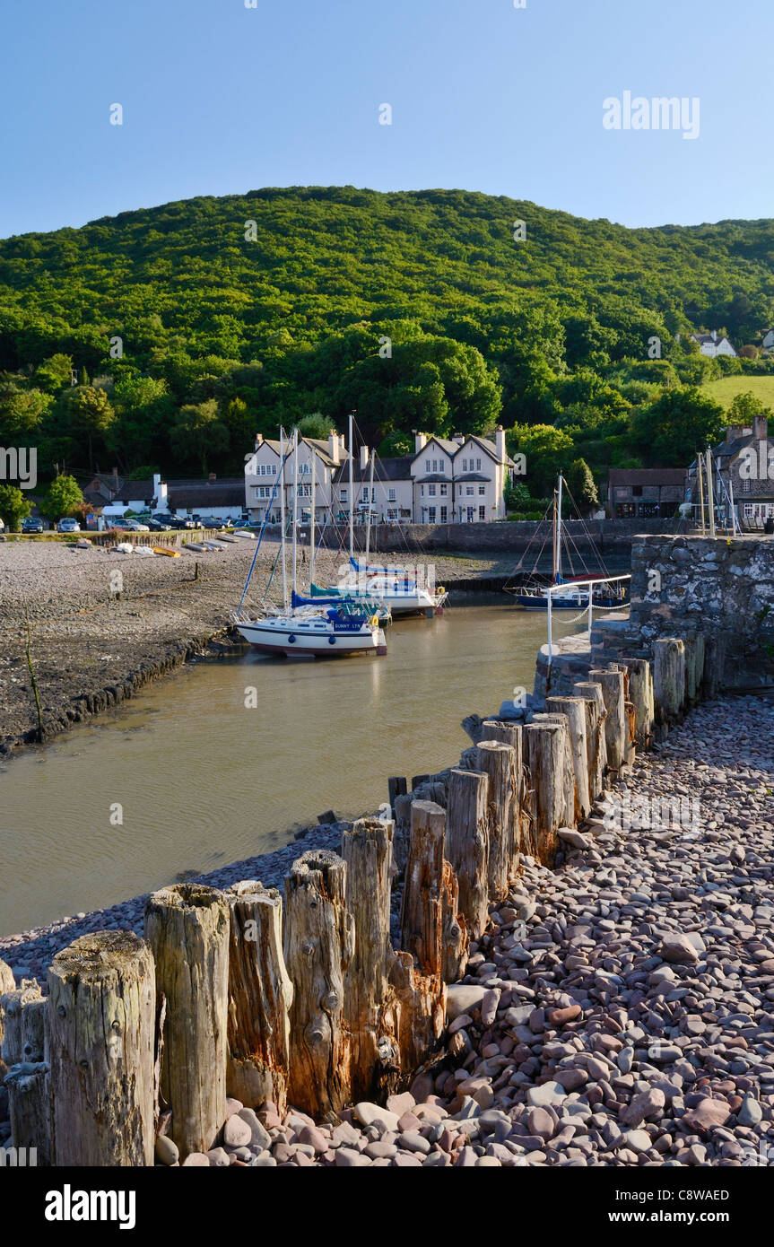 Porlock Wehr und würdig Holz im Sommer, Exmoor National Park in Somerset, England. Stockfoto