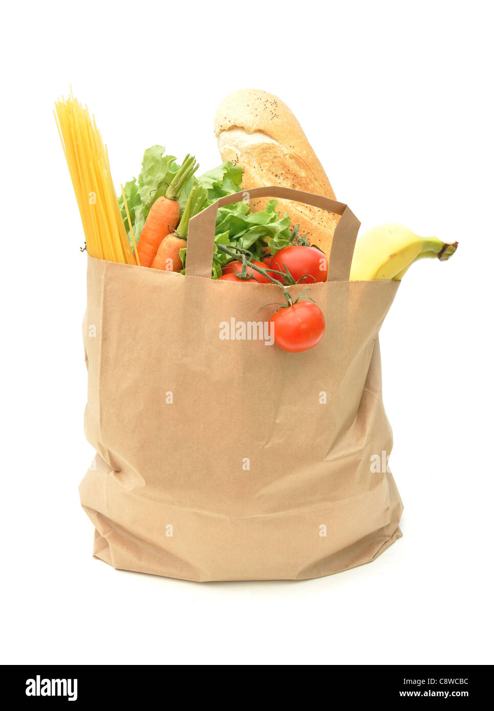 Tasche gepackt mit Obst, Gemüse und Brot Stockfoto