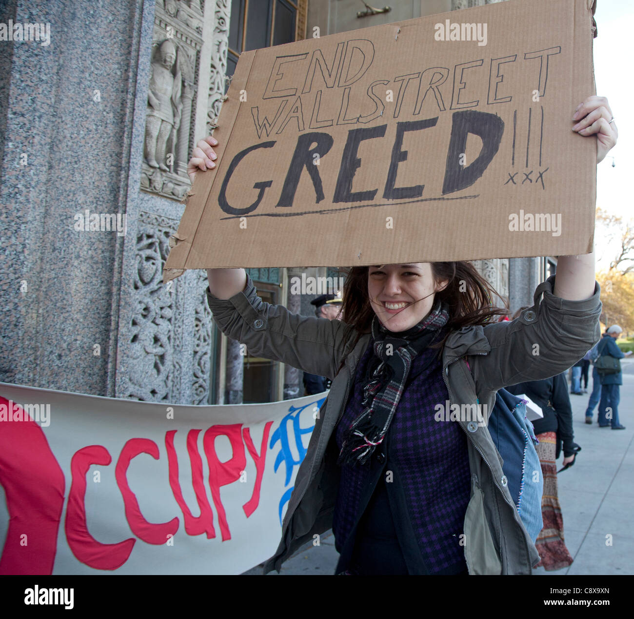 Detroit, Michigan - Mitglieder von Occupy Detroit Streikposten einen Auftritt von Duncan Niederauer, CEO der New York Stock Exchange und ehemaliger Goldman Sachs Partner. Sie Gruppe hieß Niederauer "einen Chef Schuldigen" für die aktuelle Finanzkrise verantwortlich. Stockfoto