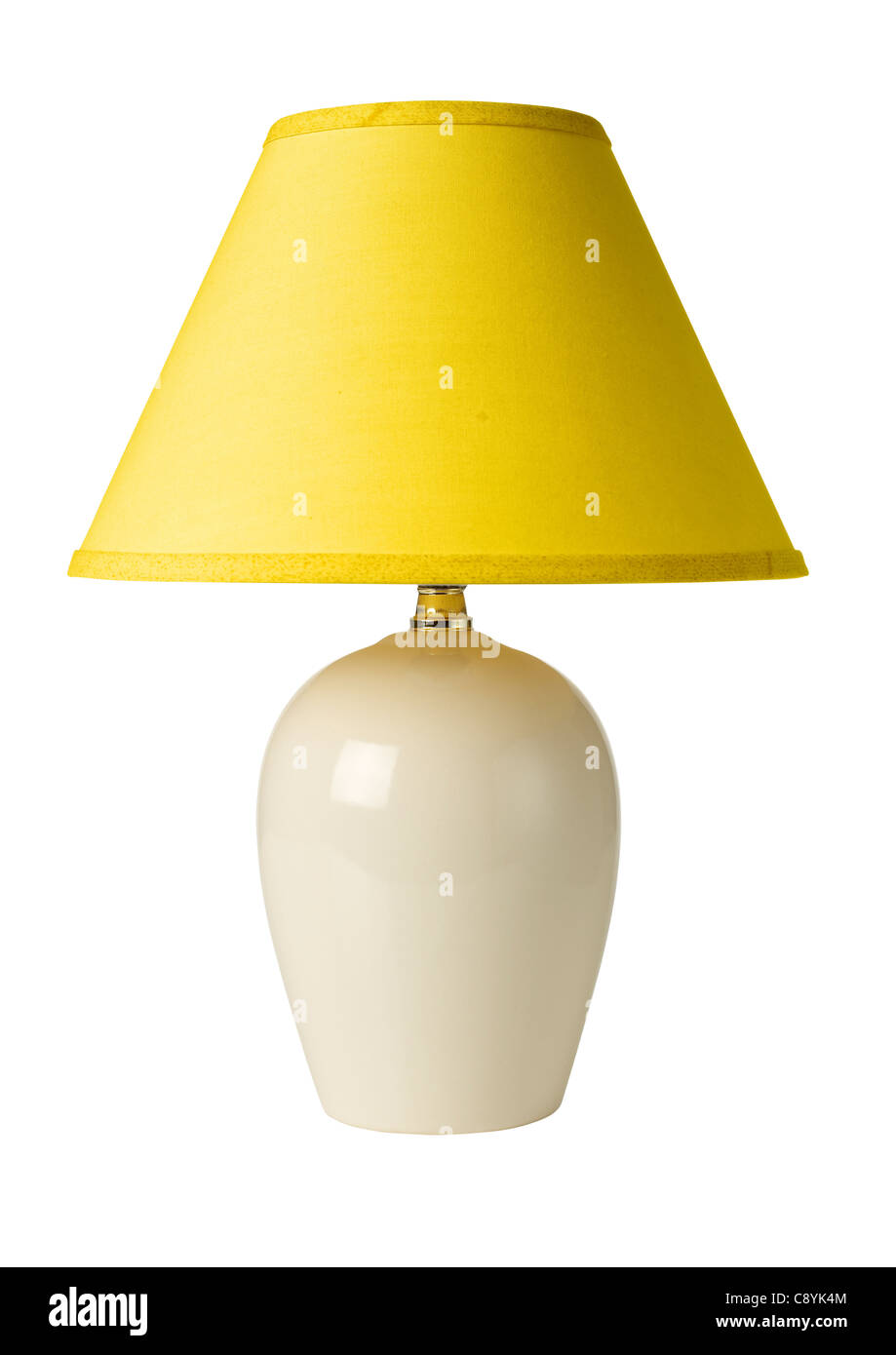 Weiße Keramik-Lampe mit gelben Farbton Stockfoto