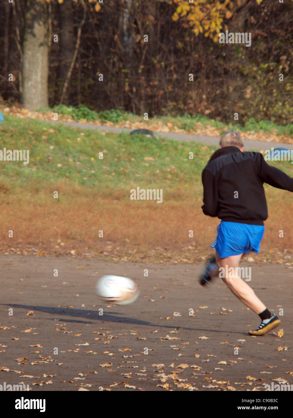 Fußballspieler und-Trainer Stockfoto