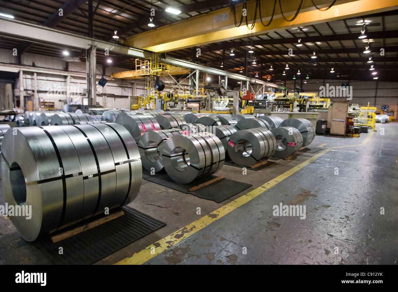 Große Rollen aus Stahl in Stahl Verarbeitungsbetrieb in Houston, Texas Stockfoto