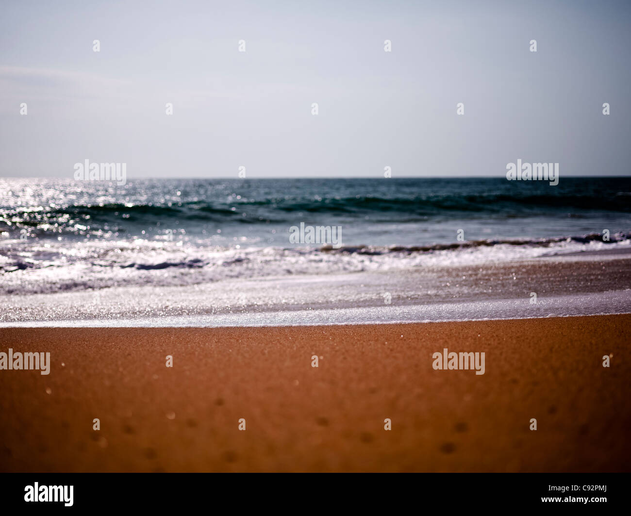 Sand und Meer in Nahaufnahme Stockfoto