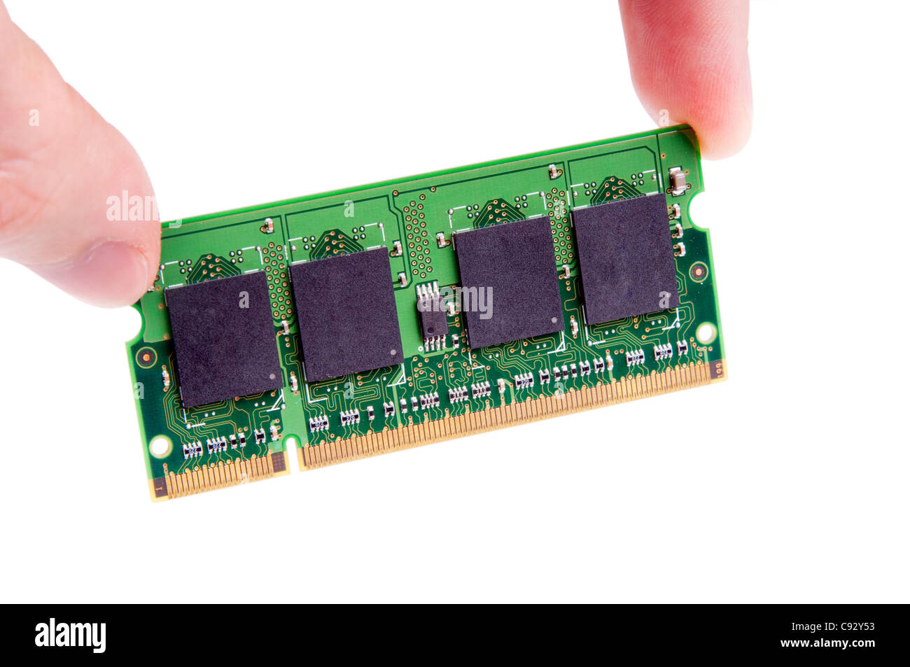 Installation eines Moduls RAM (Random Access Memory) über weiß Stockfoto