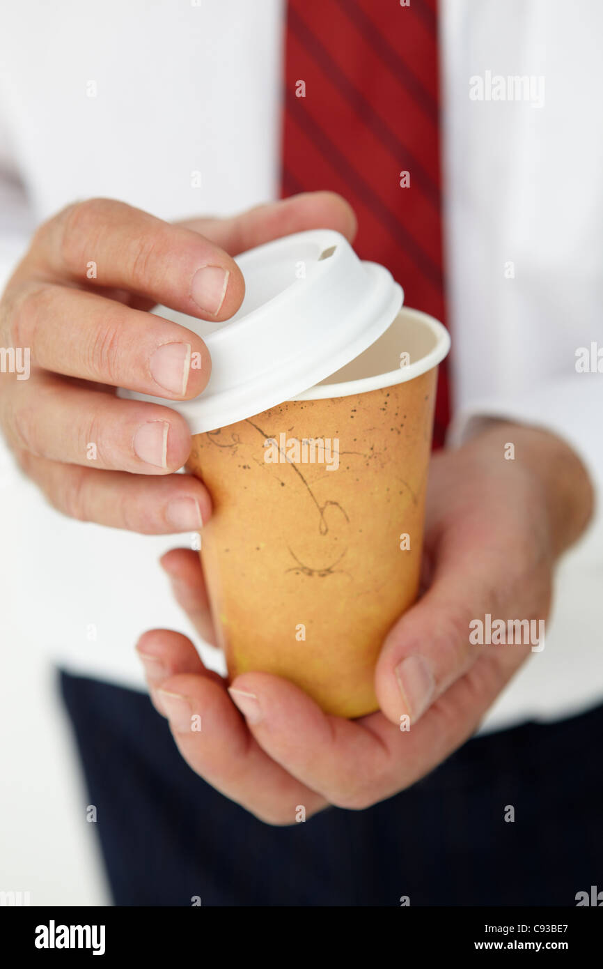 Geschäftsmann Holding Take away Kaffee Stockfoto