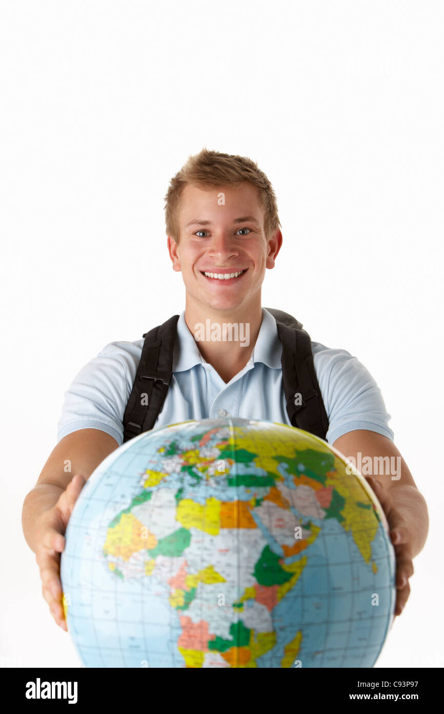 Junge Reisende mit Globus Stockfoto
