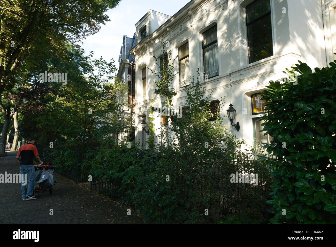 Postbote in Rotterdam Stockfoto