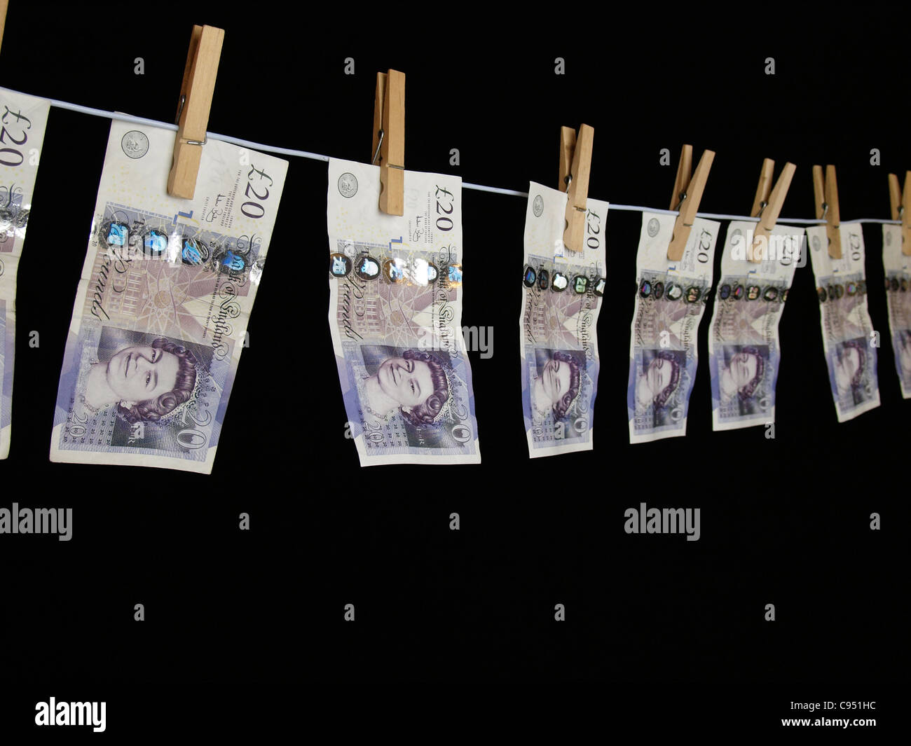£20 Notizen Pflock auf einer Wäscheleine, UK Stockfoto