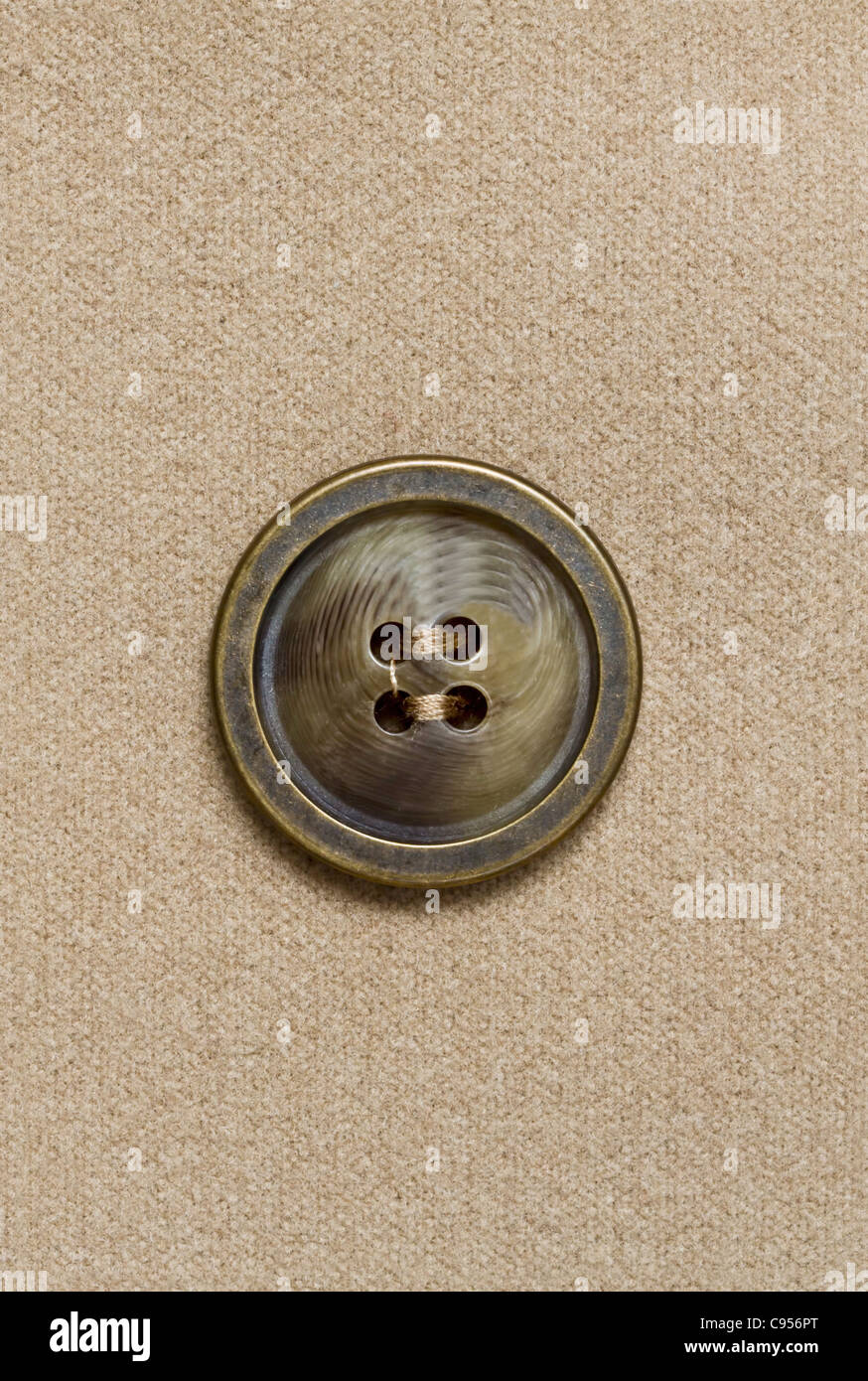 Große Taste auf Stoff Hintergrund fixiert Stockfoto