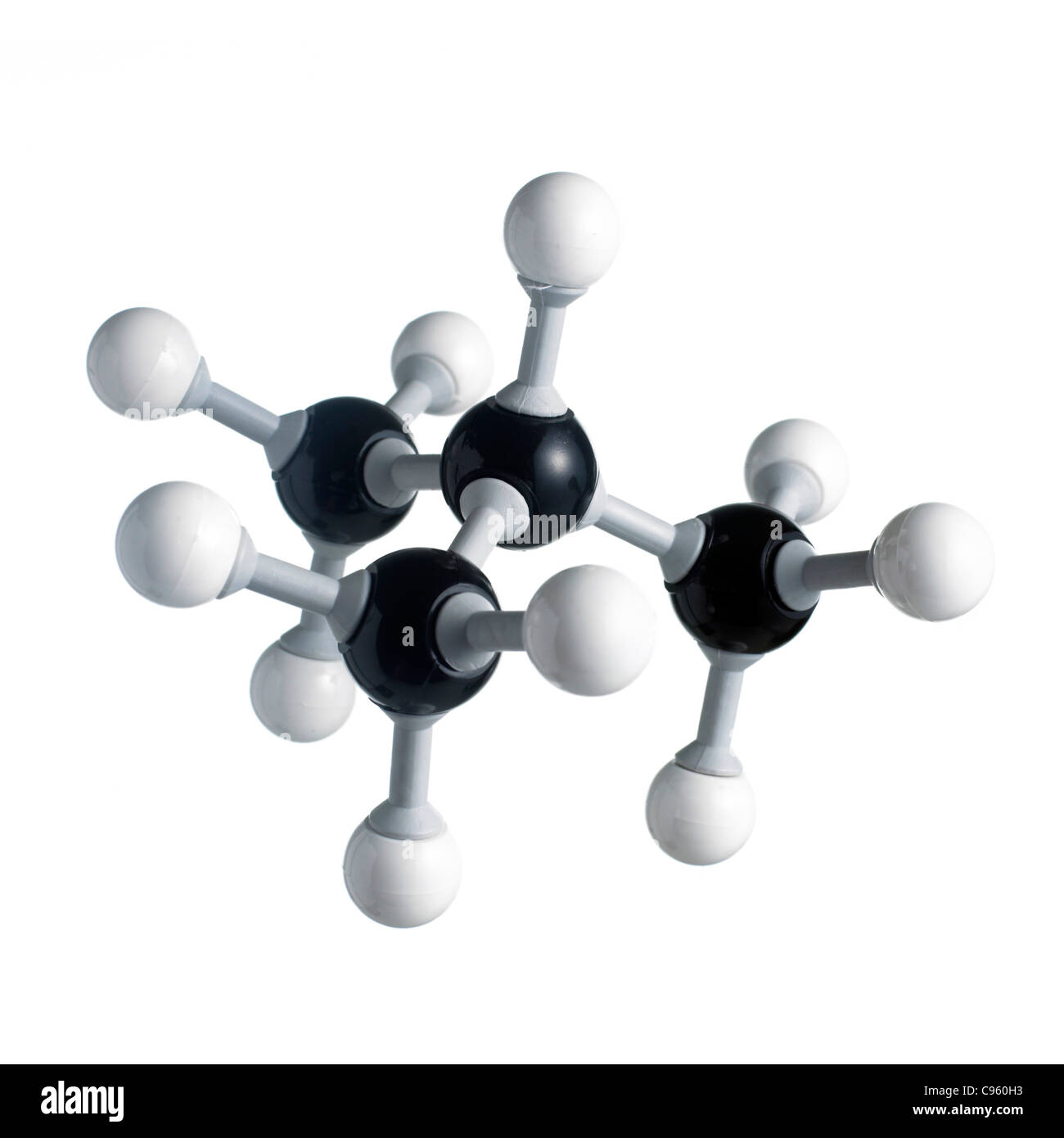Isobutan Molekül. Atome als Kugeln dargestellt werden und sind farblich gekennzeichnet: Kohlenstoff (schwarz) und Wasserstoff (weiß). Stockfoto