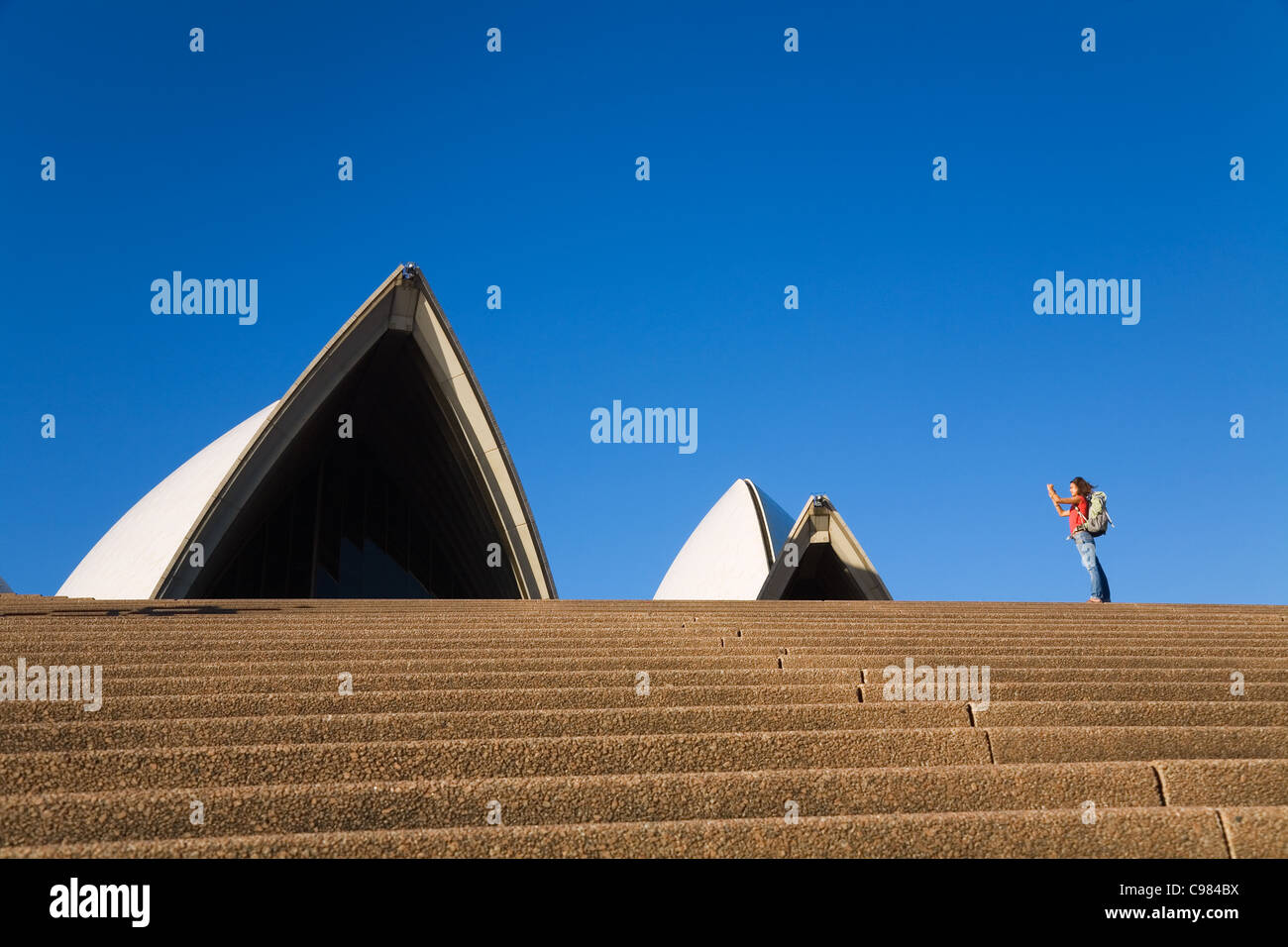 Touristen, die eine Aufnahme des Sydney Opera House. Sydney, New South Wales, Australien Stockfoto