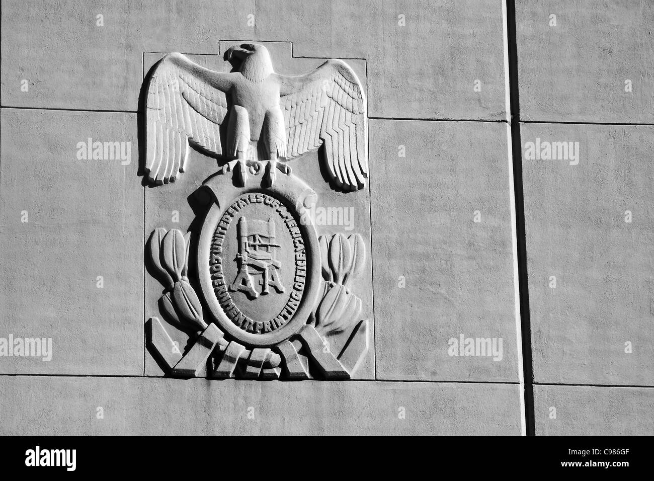 Vereinigte Staaten Regierung Druckbüro Siegel zeigt eine Adler Oldtimer Druckmaschine in Washington, D.C. Stockfoto