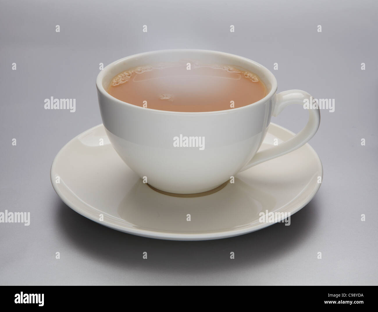 Tasse Tee, dampfend heiß Stockfoto
