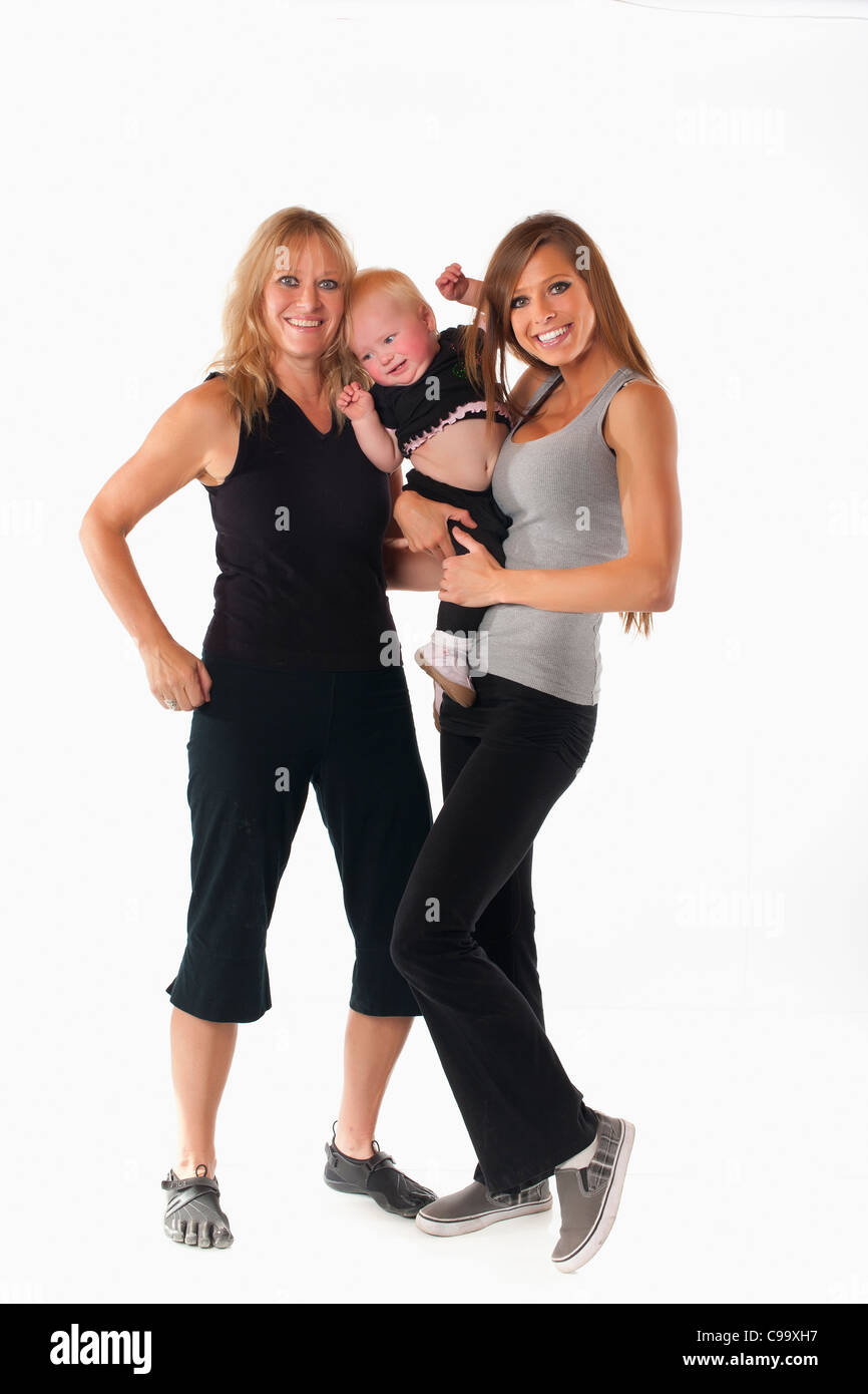 Familie Fitness - zwei Frauen und ein Kind Stockfoto