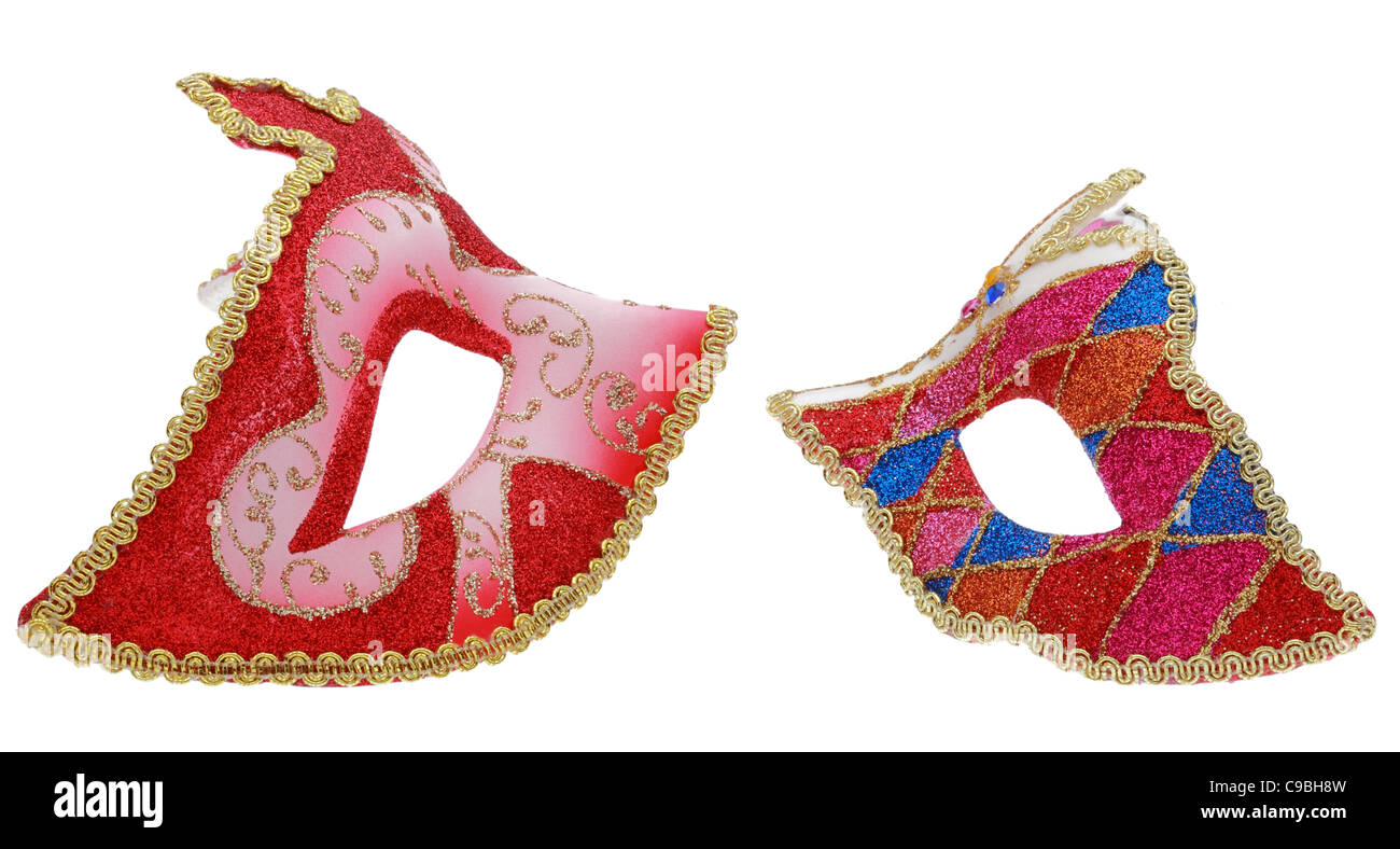 Profil-Bild von zwei venezianischen Masken isoliert auf einem weißen Hintergrund. Stockfoto